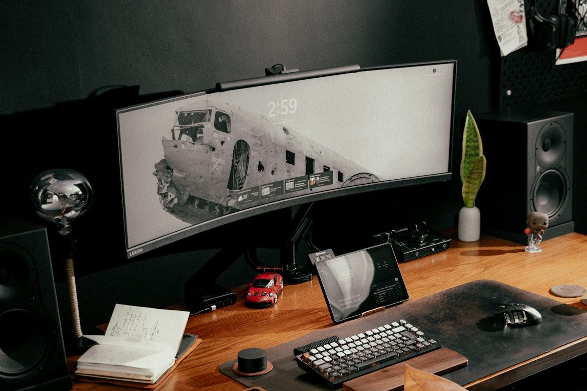 Curved ultrawide monitor on a wooden desk